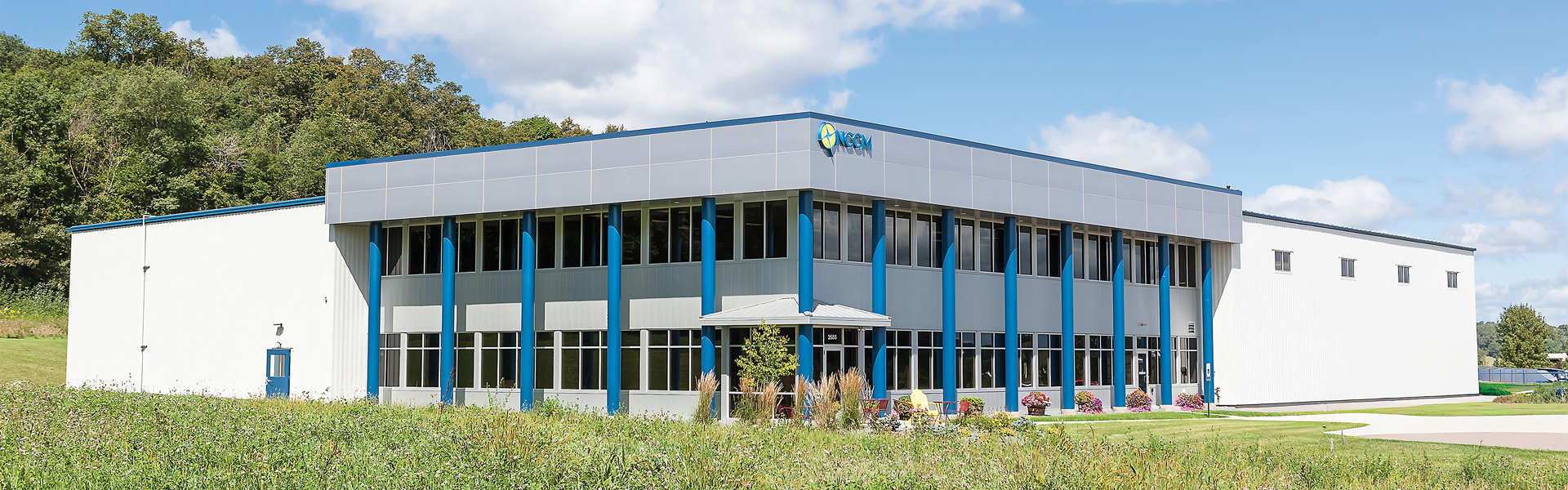 NCCM Company office building with multi-color metal panel exterior